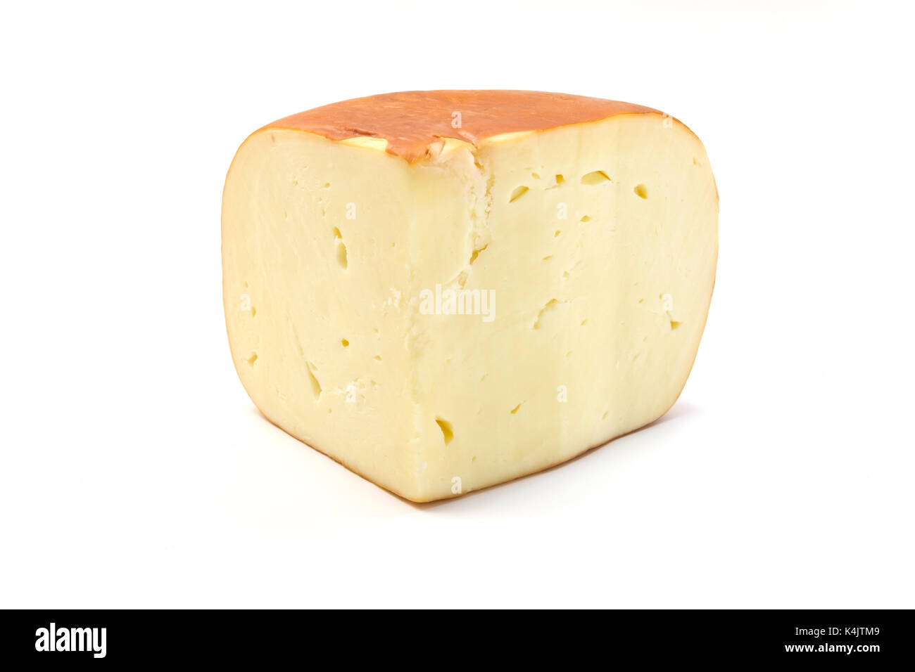 Smoked sulguni cheese on a white background Stock Photo