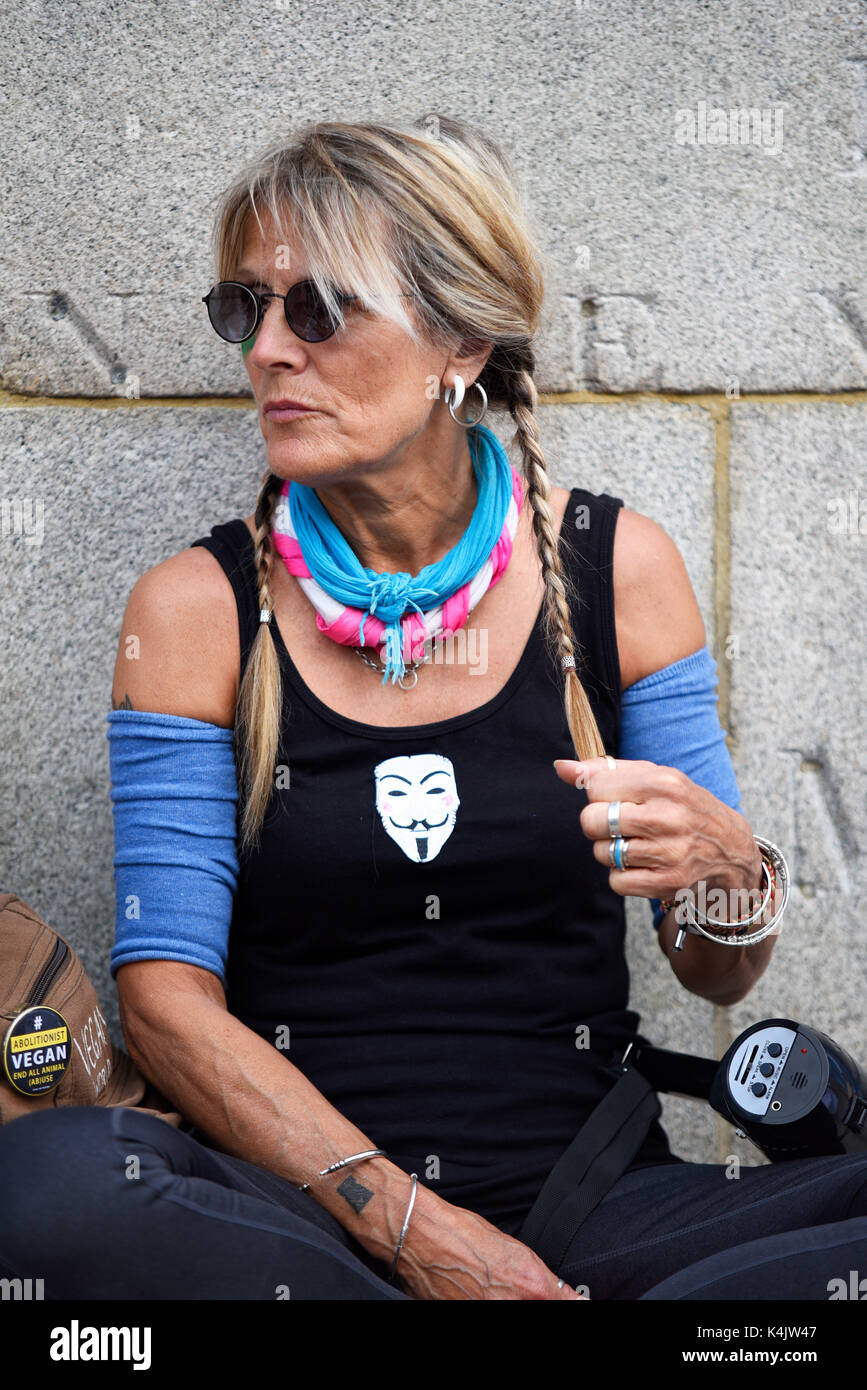 Animal rights activist at a protest march to promote the vegan lifestyle. Hyde Park, London. Hippy style female Stock Photo