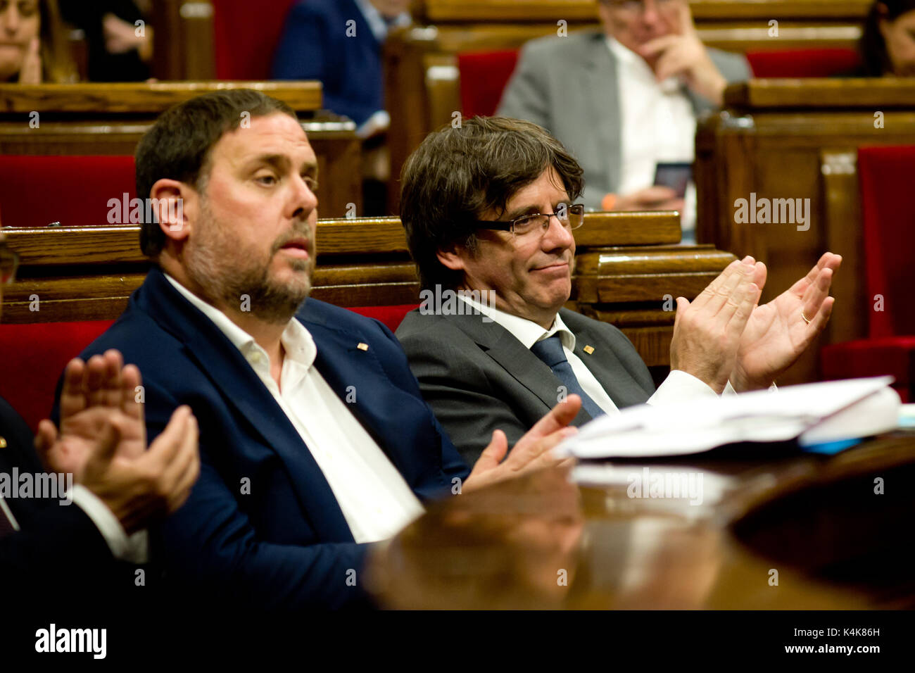 Barcelona, Catalonia, Spain. 6th Sep, 2017. Catalan regional president CARLES PUIGDEMONT (R) and catalan vice-president ORIOL JUNQUERAS (L) during the parliamentary session in the Catalonia Parliament. The Catalan Parliament has passed a law to call a referendum of independence the next first of October. The unionist forces of Catalonia and the Spanish government are frontally opposed to the referendum and consider it illegal. Credit: Jordi Boixareu/ZUMA Wire/Alamy Live News Stock Photo