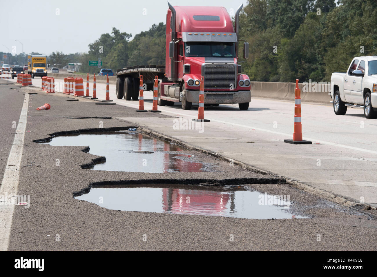 Beaumont, Texas Sept. 6, 2017: Infrastructure problems on flood-damaged roads continue to plague east Texas as it recovers from Hurricane Harvey, which hit almost two weeks ago on Aug. 25th, 2017. Credit: Bob Daemmrich/Alamy Live News Stock Photo
