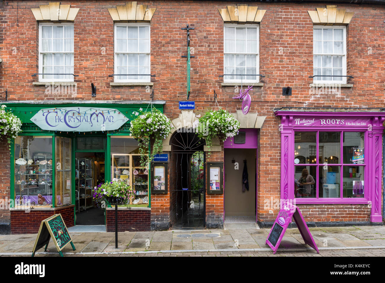 Shops in Northload Street, Glastonbury, Somerset, England Stock Photo
