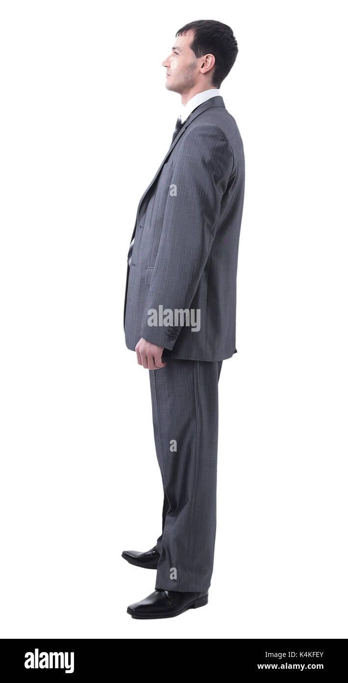 Side view of serious businessman with crossed hands on white Stock Photo