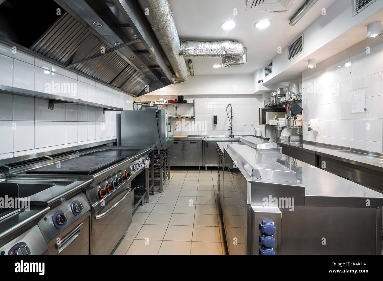 Commercial kitchen in a restaurant with stainless equipment Stock Photo