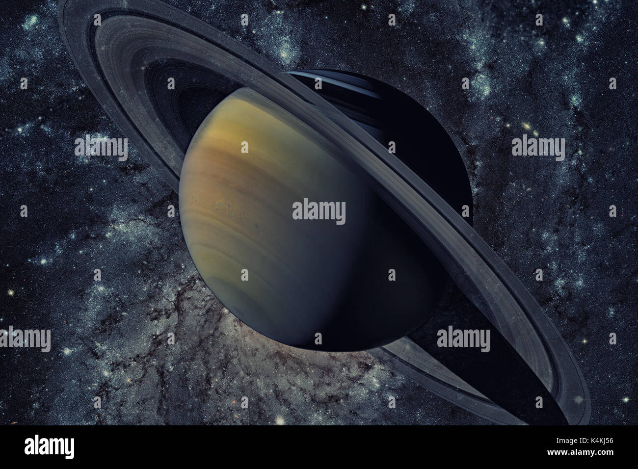 Solar System - Saturn. It is the sixth planet from the Sun and the second-largest in the Solar System. It is a gas giant planet and has a ring system. Stock Photo