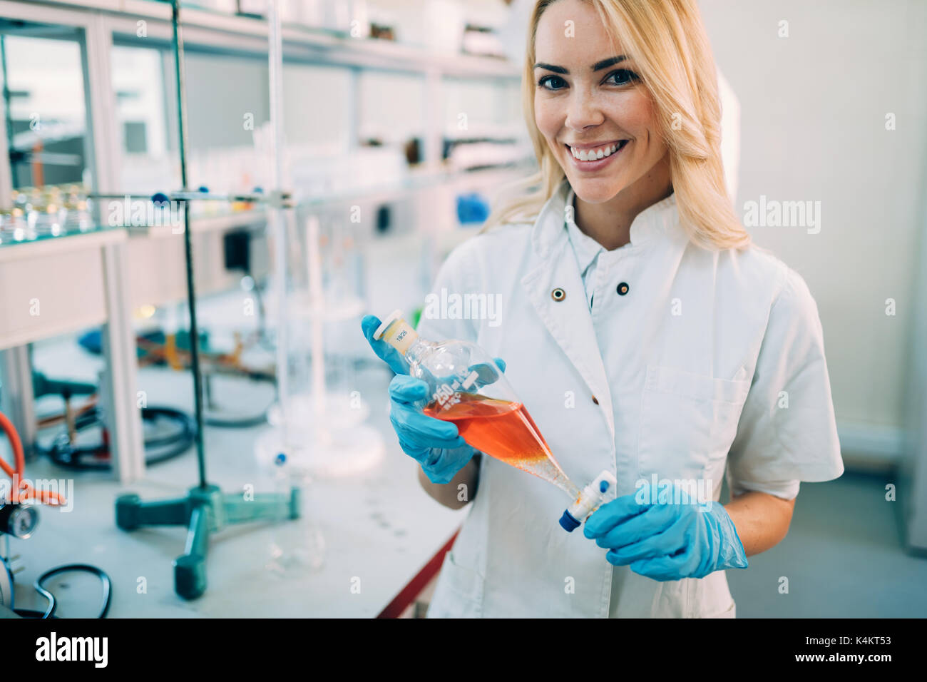Attractive student of chemistry working in laboratory Stock Photo