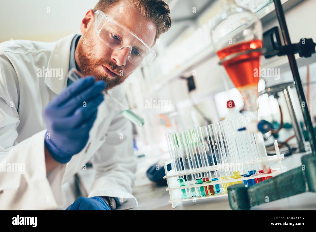 Attractive student of chemistry working in laboratory Stock Photo