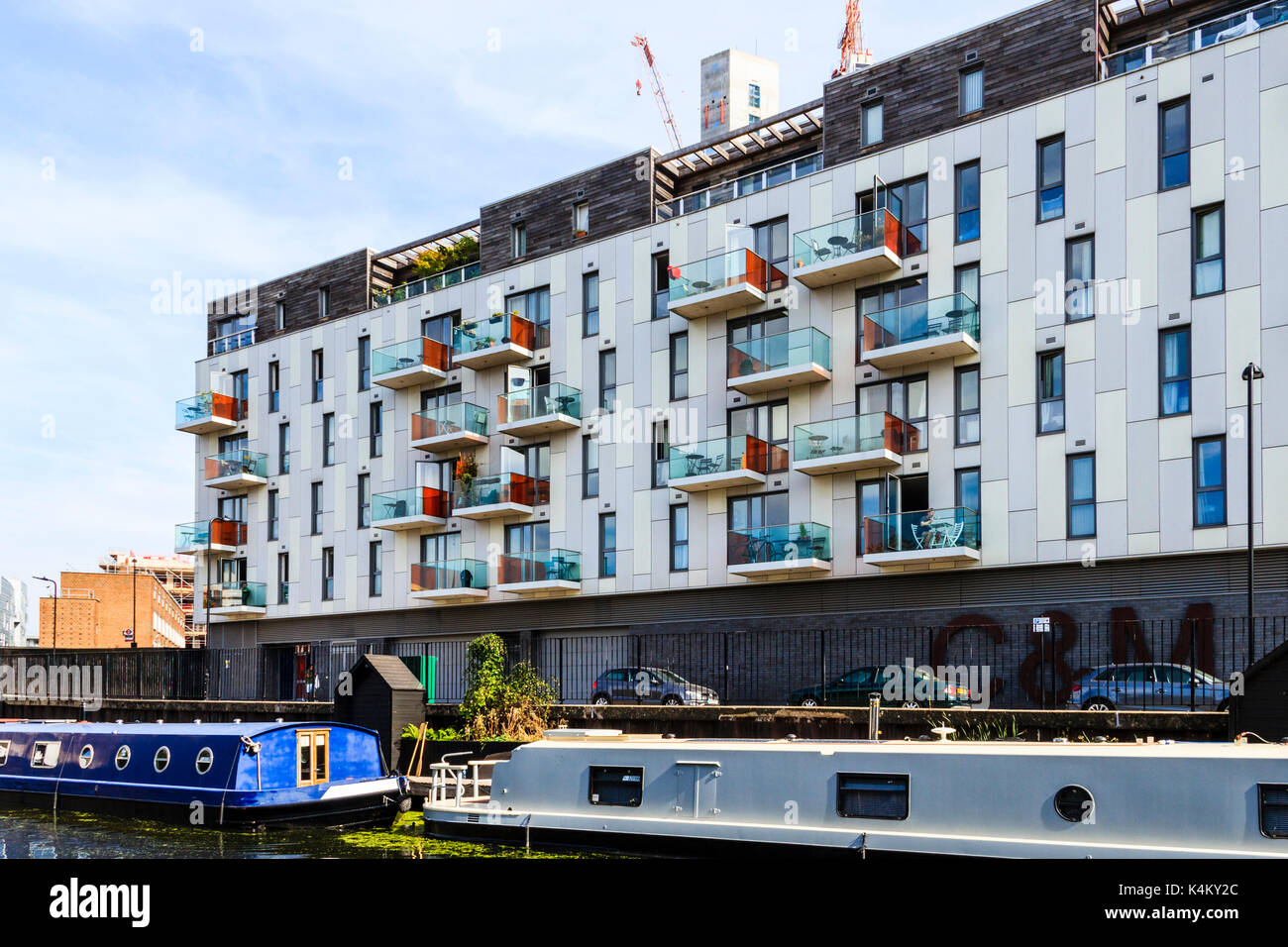 Apartments with brightly coloured balconies at the rear of Wiltshire Row, Regent's Canal
