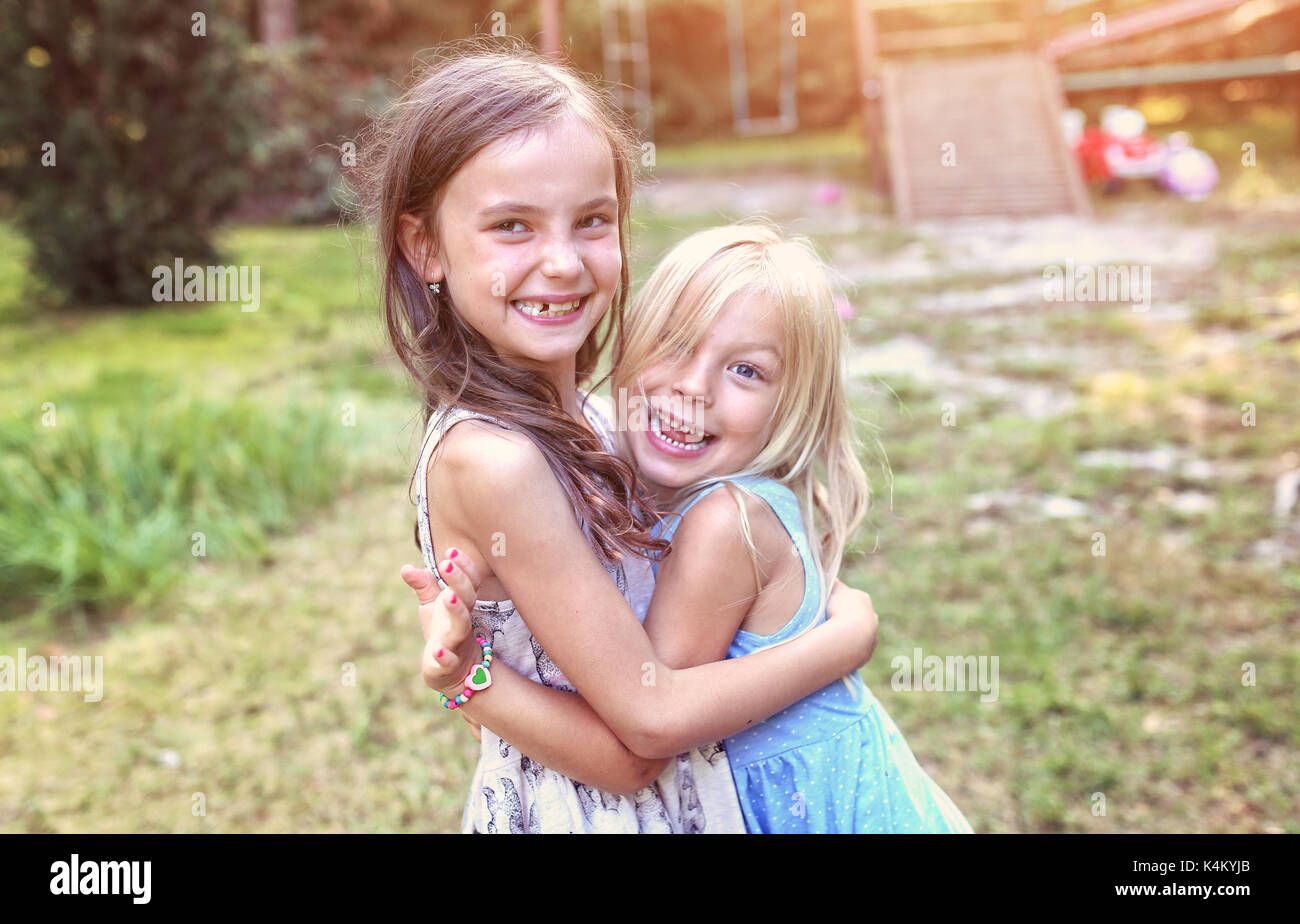 Sweet laughter of two young friends Stock Photo