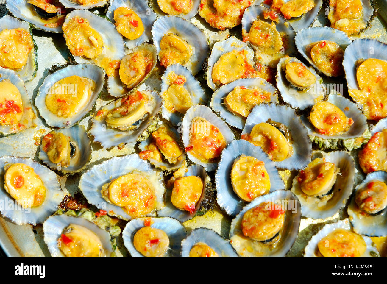 Grilled limpets. A delicacy of Azores islands. Sao Jorge, Portugal Stock Photo