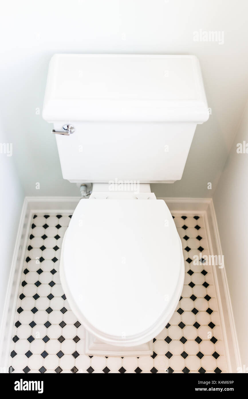 Staging Modern Clean White Toilet In Restroom With Tiled Floor In Model House Home Or Apartment Stock Photo Alamy