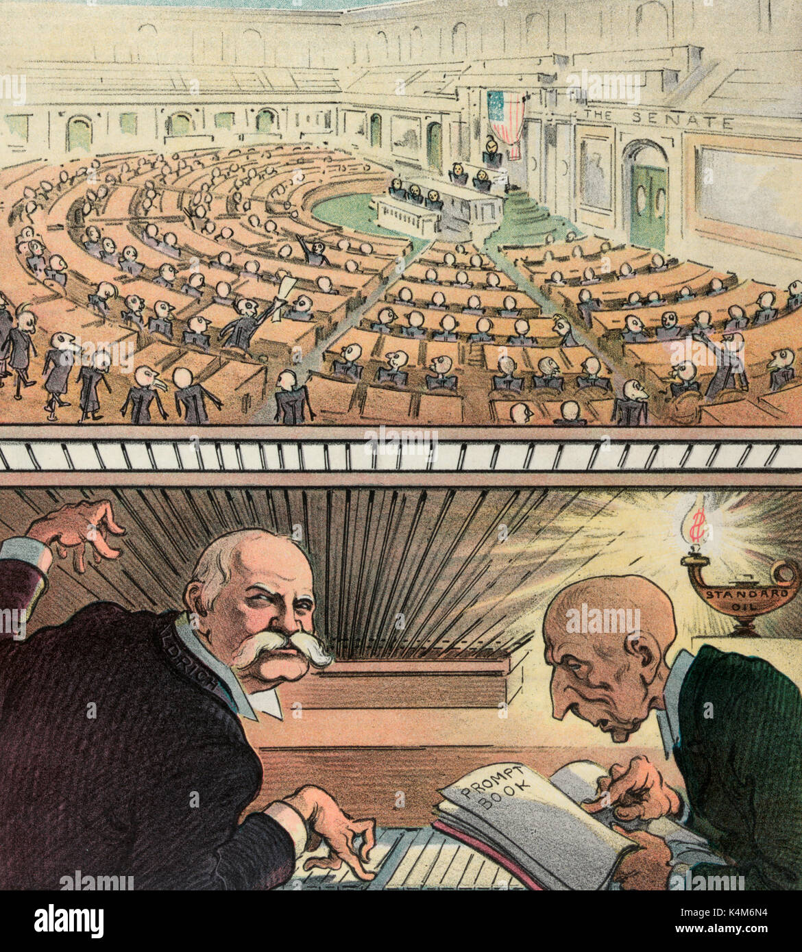 At the keyboard - Illustration shows Nelson Aldrich and J.D. Rockefeller sitting at a keyboard overlooking Congress in session at the U.S. Capitol; Rockefeller is holding a 'Prompt Book' as Aldrich plays the instrument; they are illuminated by the flame of an oil lamp labeled 'Standard Oil'. Political Cartoon, circa 1905 Stock Photo