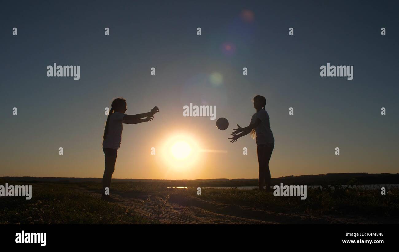 Girls teenagers playing ball Stock Photo Alamy