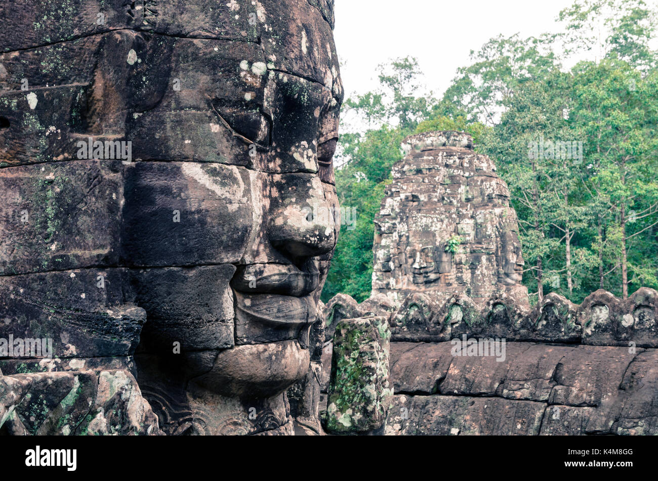 Bayon temple faces Stock Photo - Alamy