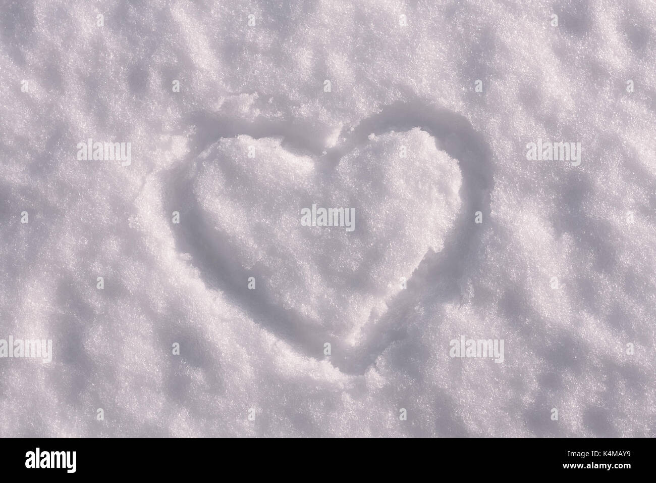 Hand Drawing With Heart Shape On White Snow For Day Valentine Stock ...