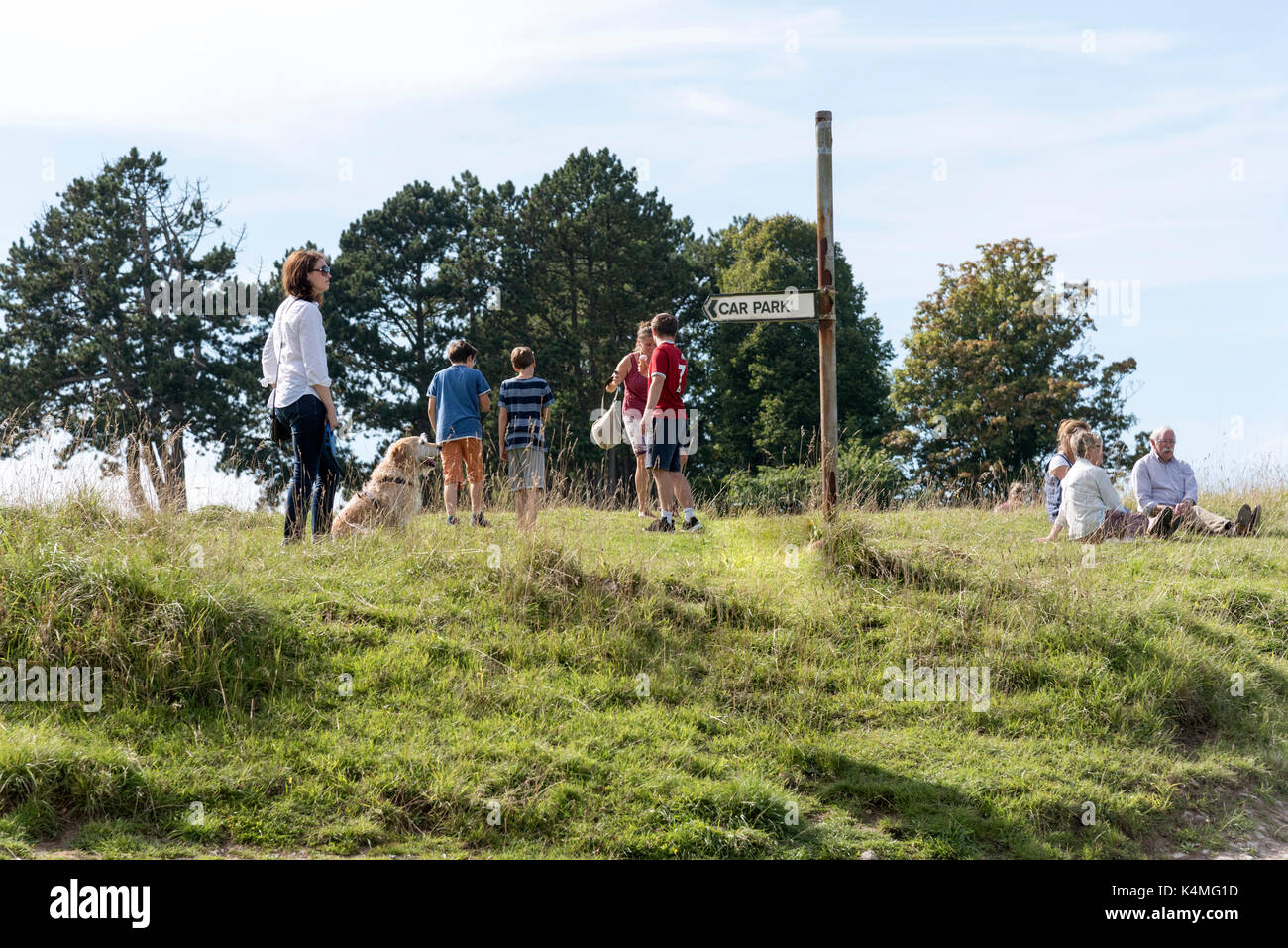 Visitors on Rodborough Common in the southern Cotswolds close to Stroud Gloucestershire England UK Stock Photo