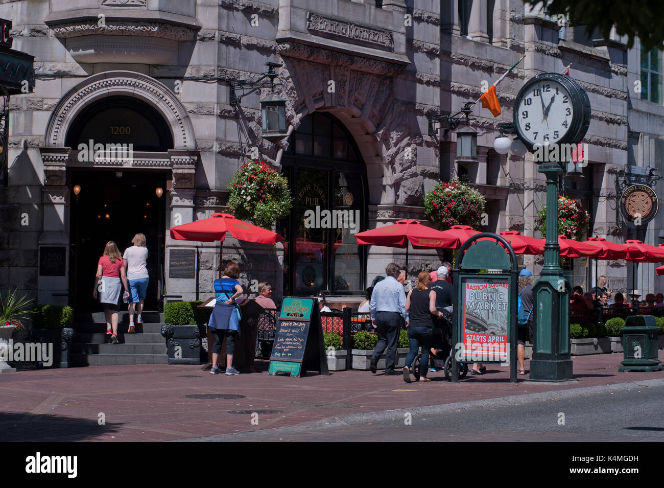 Patrons and diners sitting on outdoor patio of restaurant, Victoria