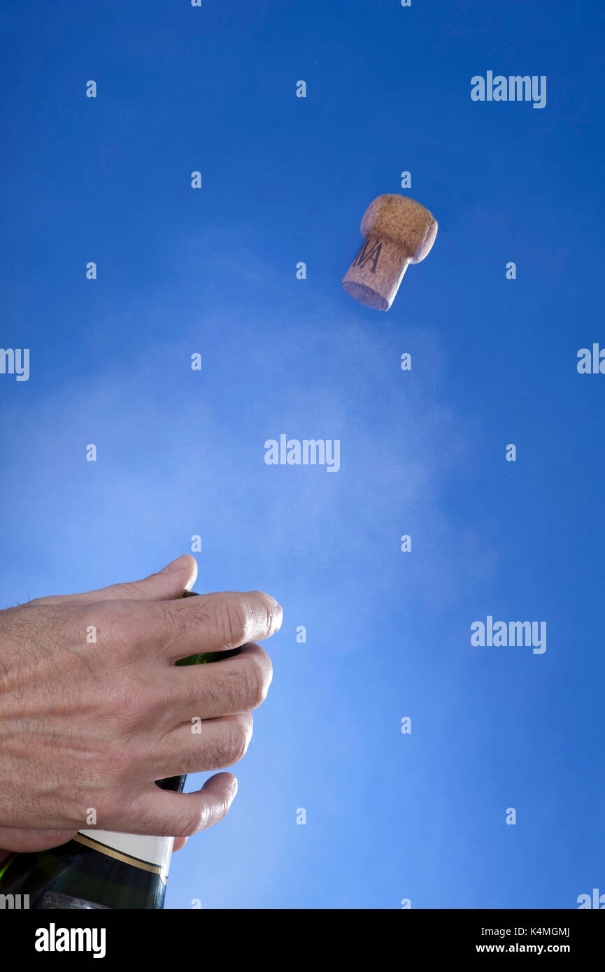 Champagne cork popping, highspeed image. The pressure of gas from the