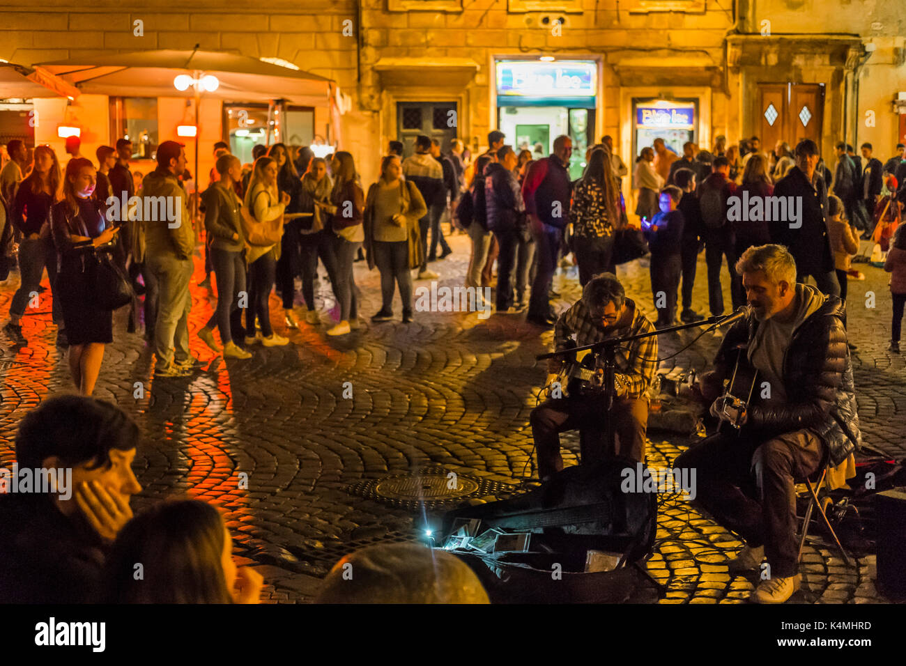 street musicians at piazza santa maria, trastevere Stock Photo