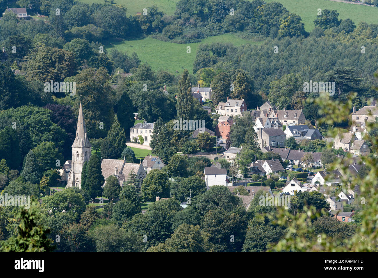An overview of Woodchester and St Marys Church from Amberley Gloucestershire England UK over the Nailsworth Valley Stock Photo