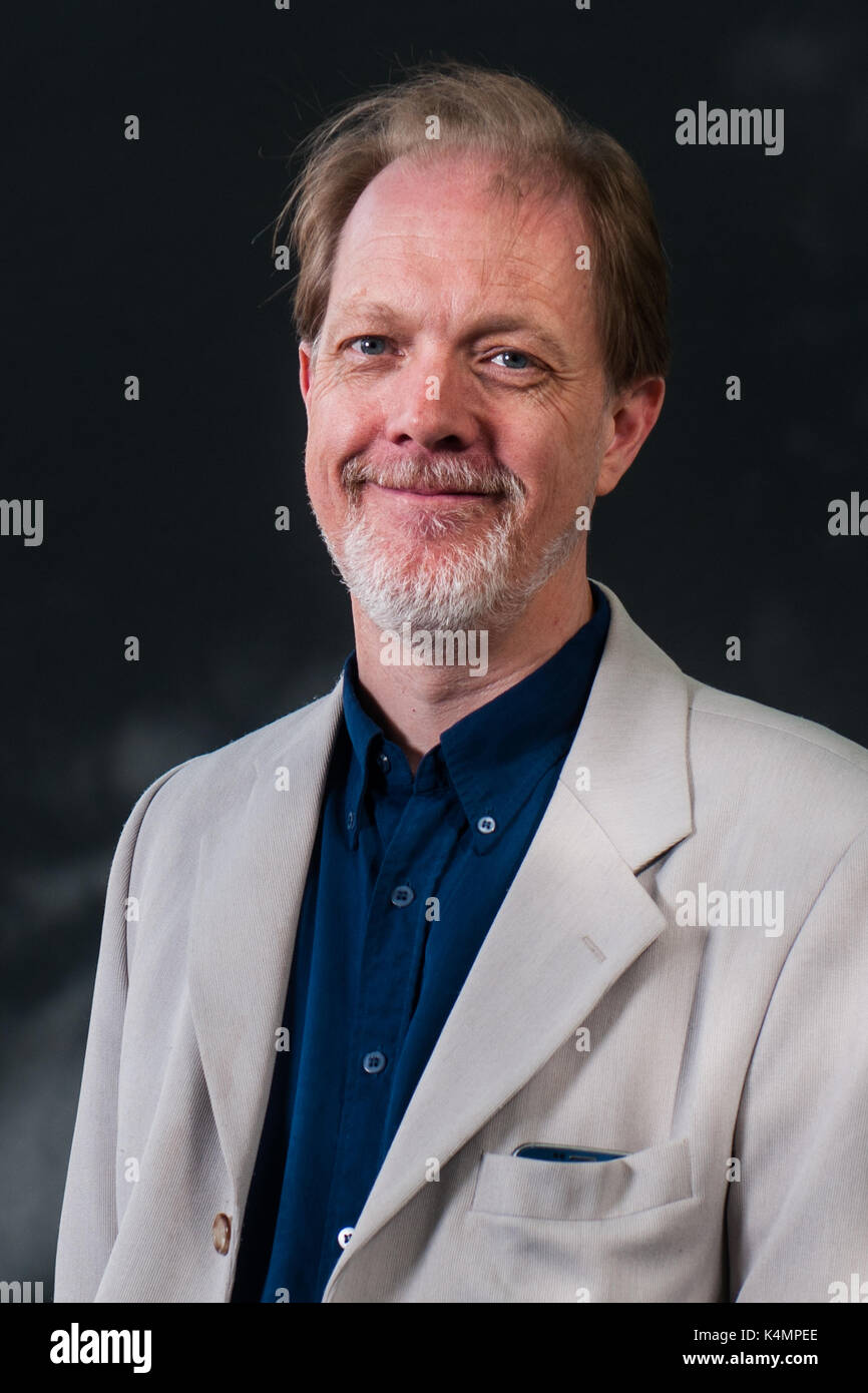 British science fiction and fantasy novelist Adam Roberts attends a photocall during the Edinburgh International Book Festival on August 12, 2017 in E