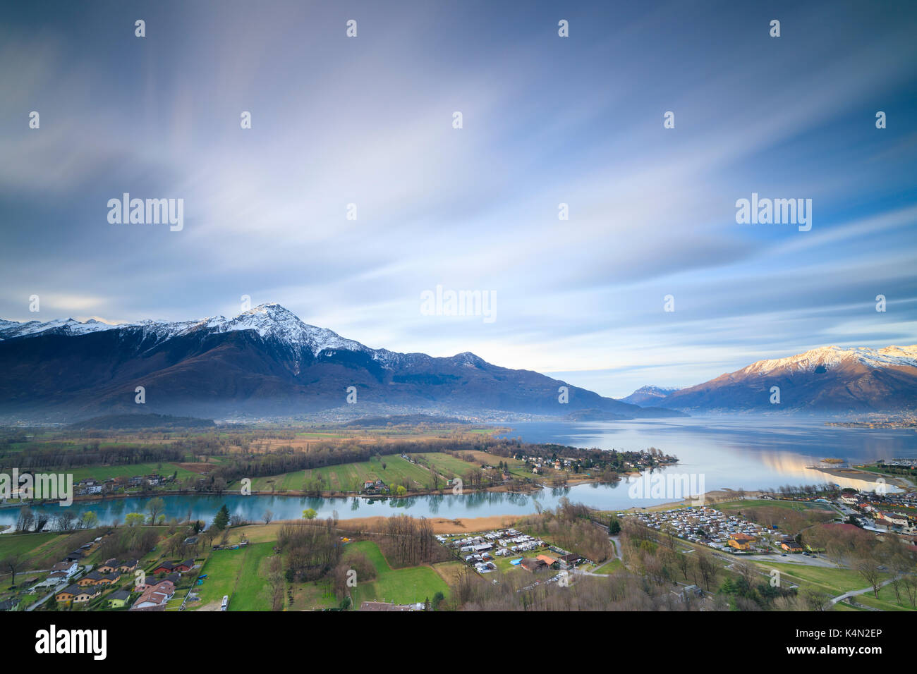 View of Sorico at dawn framed by Lake Como and snowy peaks seen from Chiesa Di San Miro, Province of Como, Lombardy, Italy, Europe Stock Photo