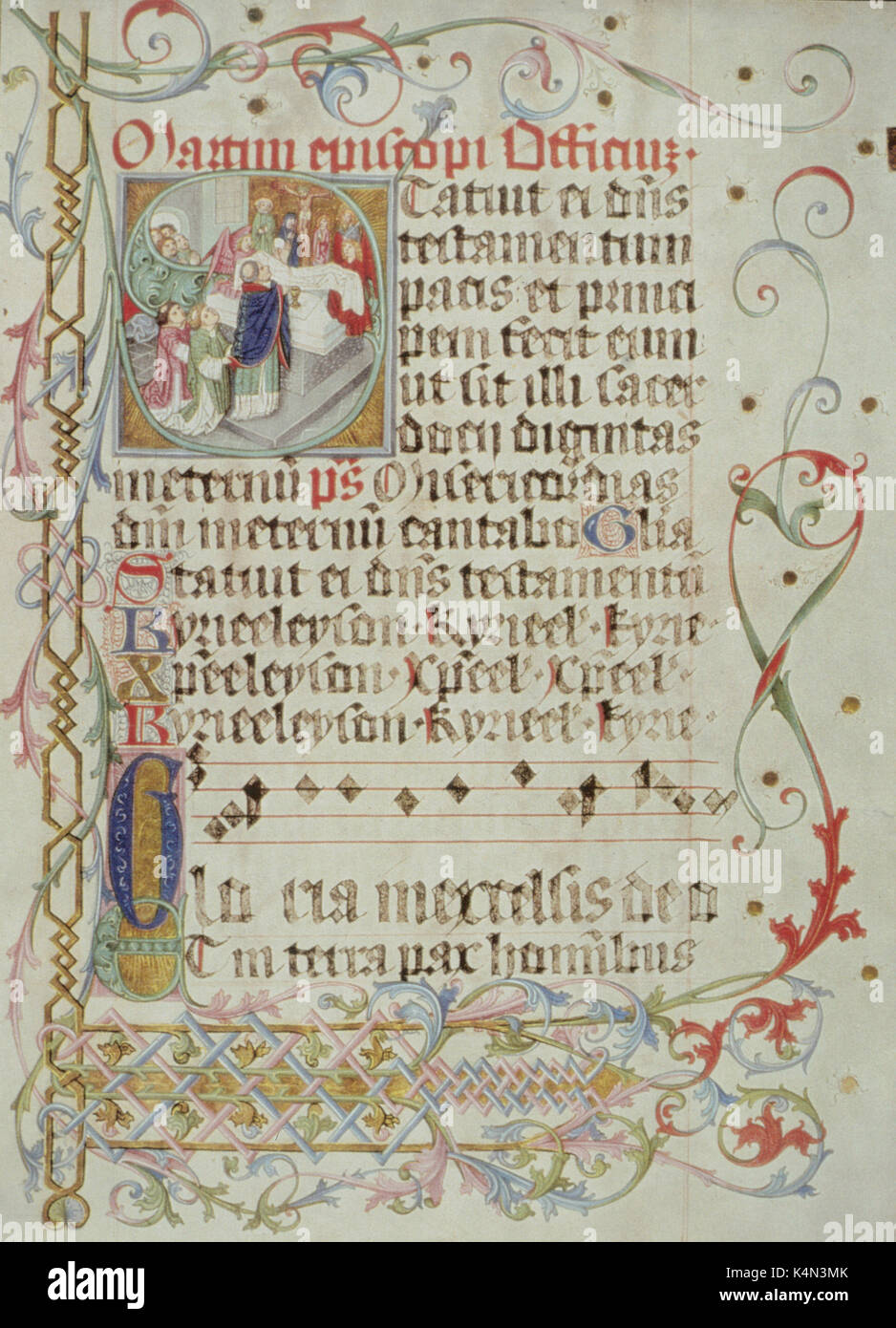 Medieval score - 'INTROIT AND GLORIA' - 1481. Illuminated manuscript. Example of Gregorian chant. Plainsong. Music written on four line stave - black notes on red lines.  For Martinmas from the Furtmeyer Missal for Archbishop Bernard of Salzburg. Example of Gregorian chant. Plainsong. Stock Photo