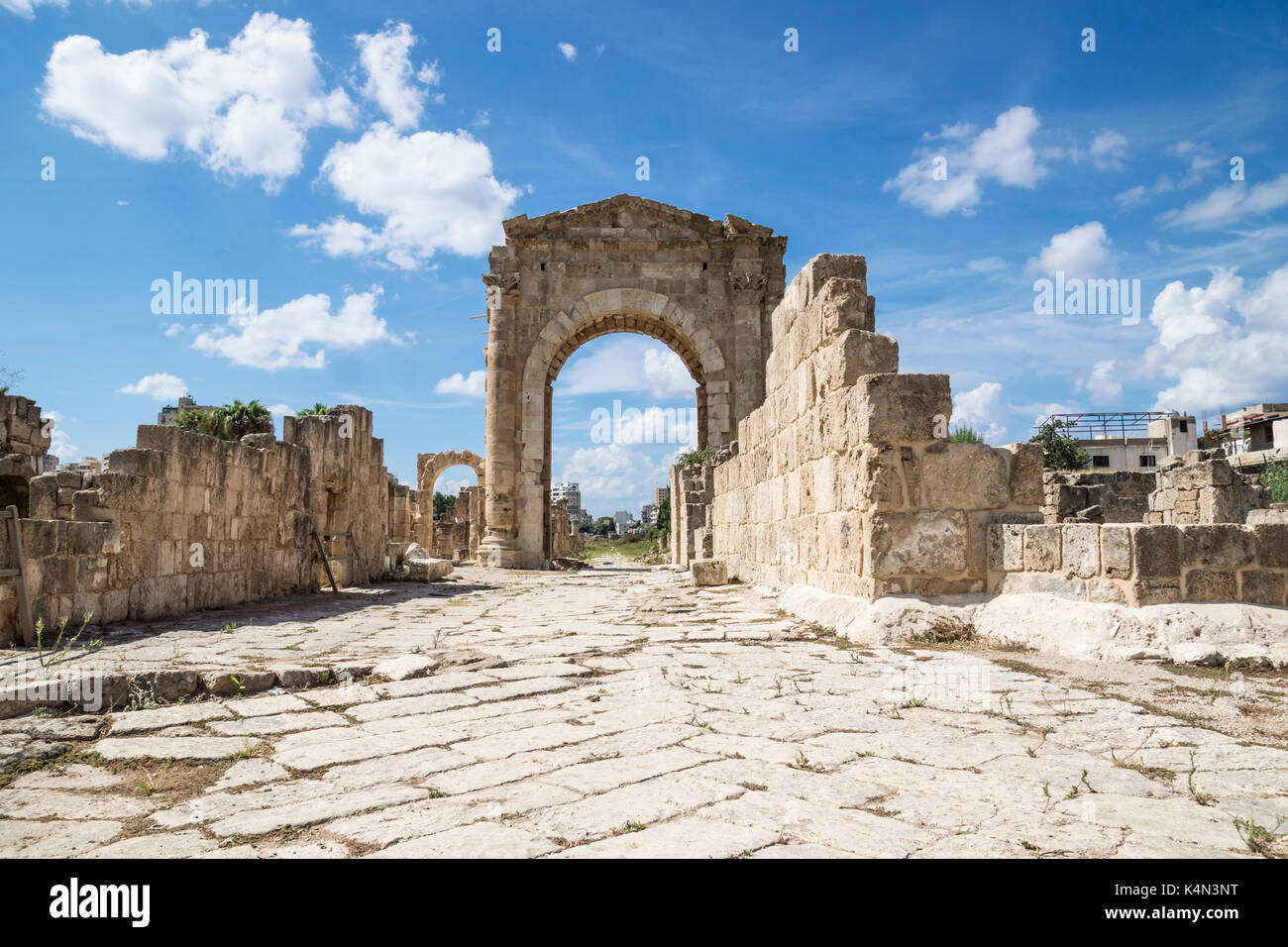 Al-Bass, Byzantine road with triumph arch in ruins of Tyre, Lebanon Stock Photo