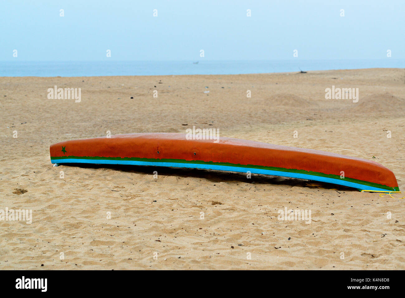 Traditional fishing boat upside down on a beach Stock Photo Alamy