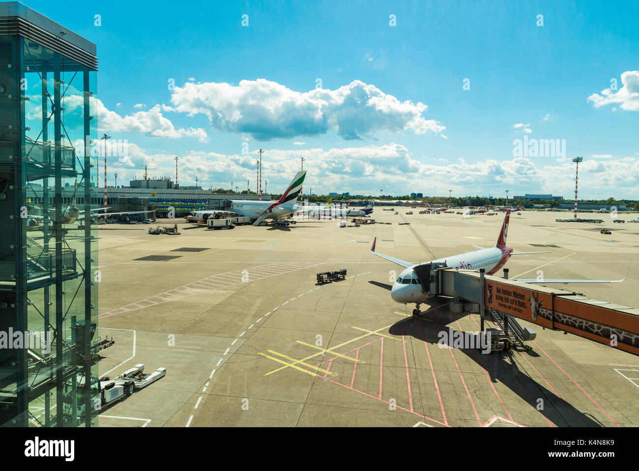 Dusseldorf, Germany - April 17, 2017: Airplane with a finger decorated with a neck of a giraffe at Dusseldorf airport in Dusseldorf, Germany Stock Photo