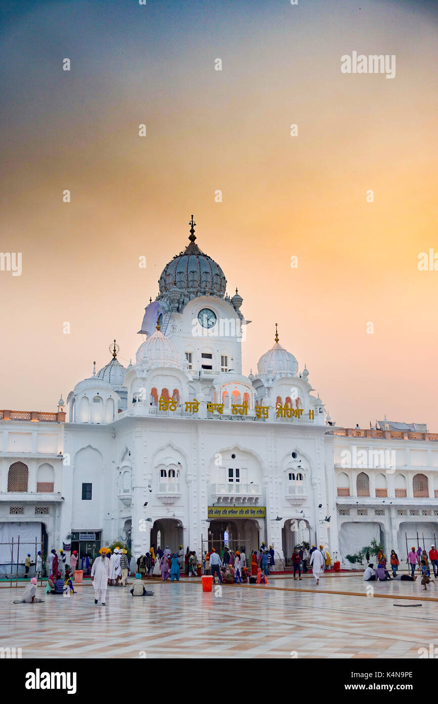 The entrance to the Golden Temple in Amritsar at sunrise Stock Photo