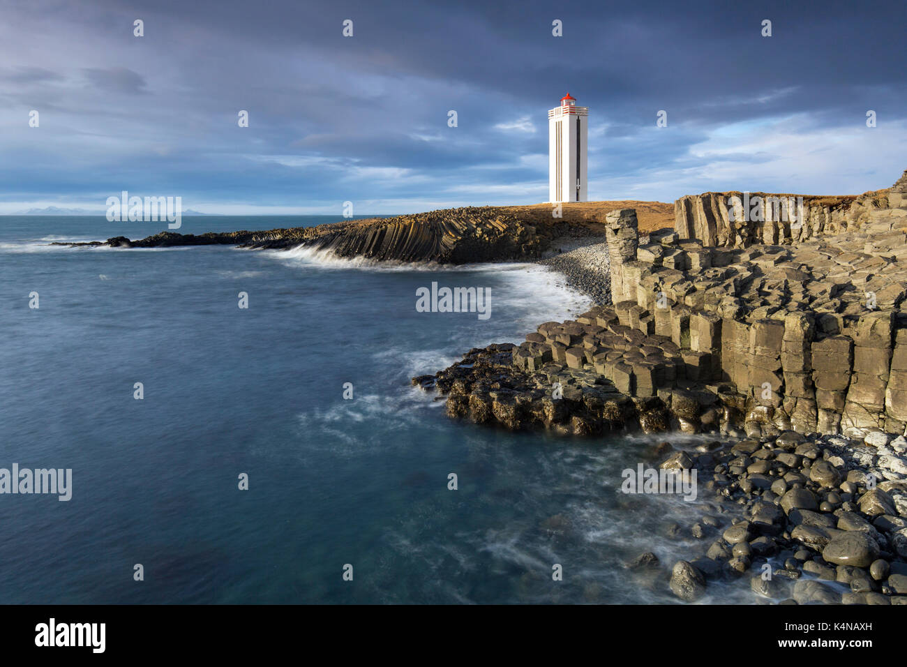 Basalt columns and the Kálfshamarsvík lighthouse near Skagaströnd on