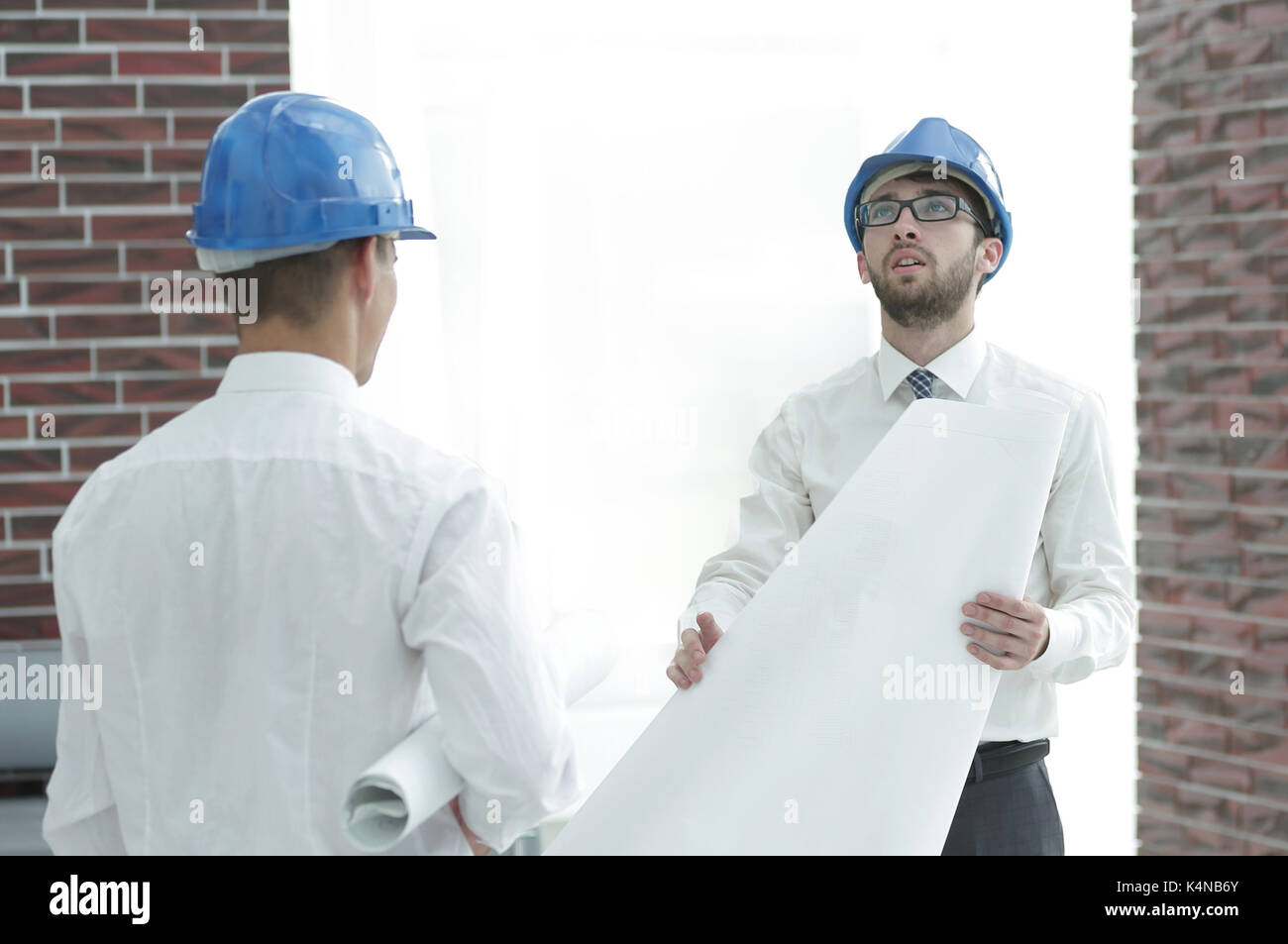 architect and construction foreman to discuss the project Stock Photo
