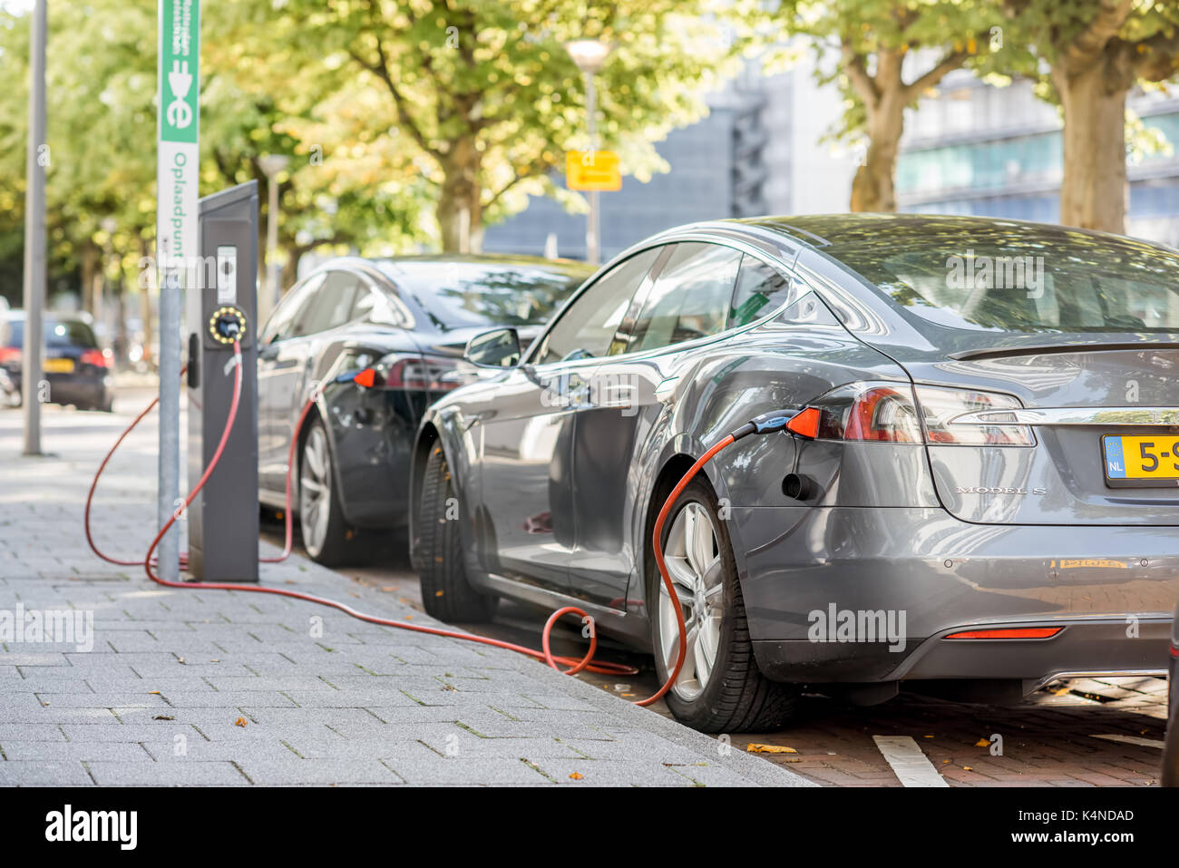 Tesla charging outdoors Stock Photo