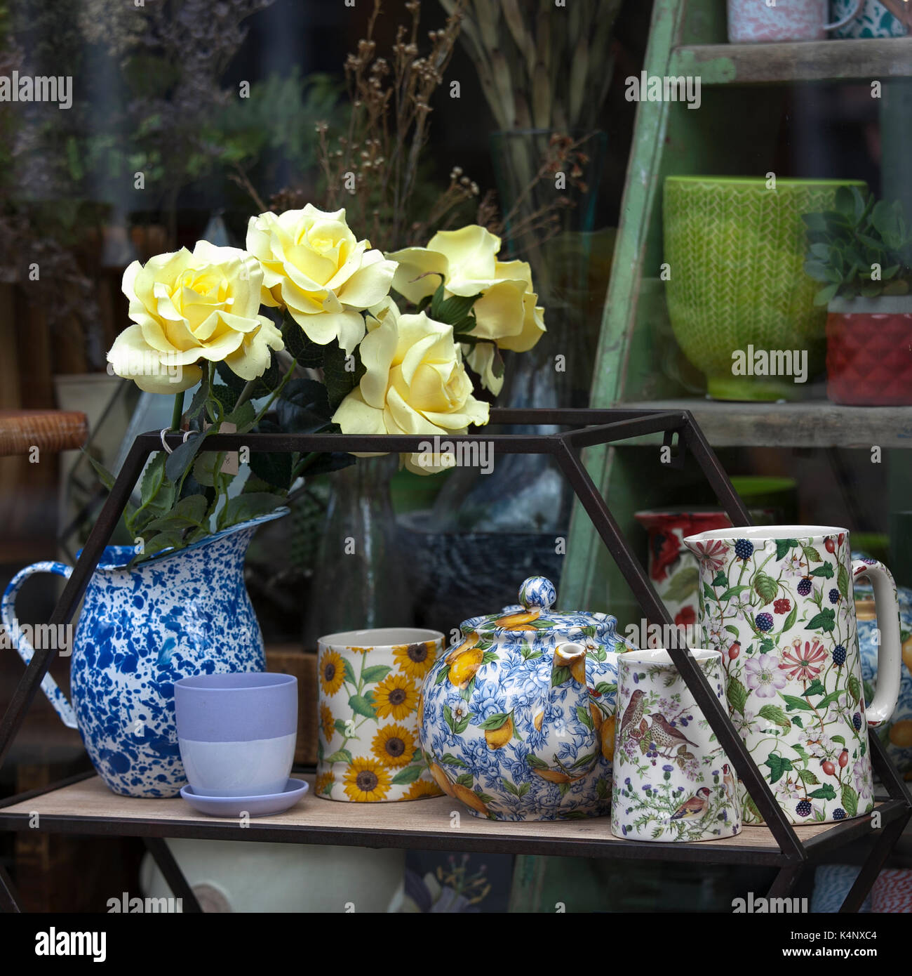 London England August 20 2017 Dishes And A Vase Of Flowers In