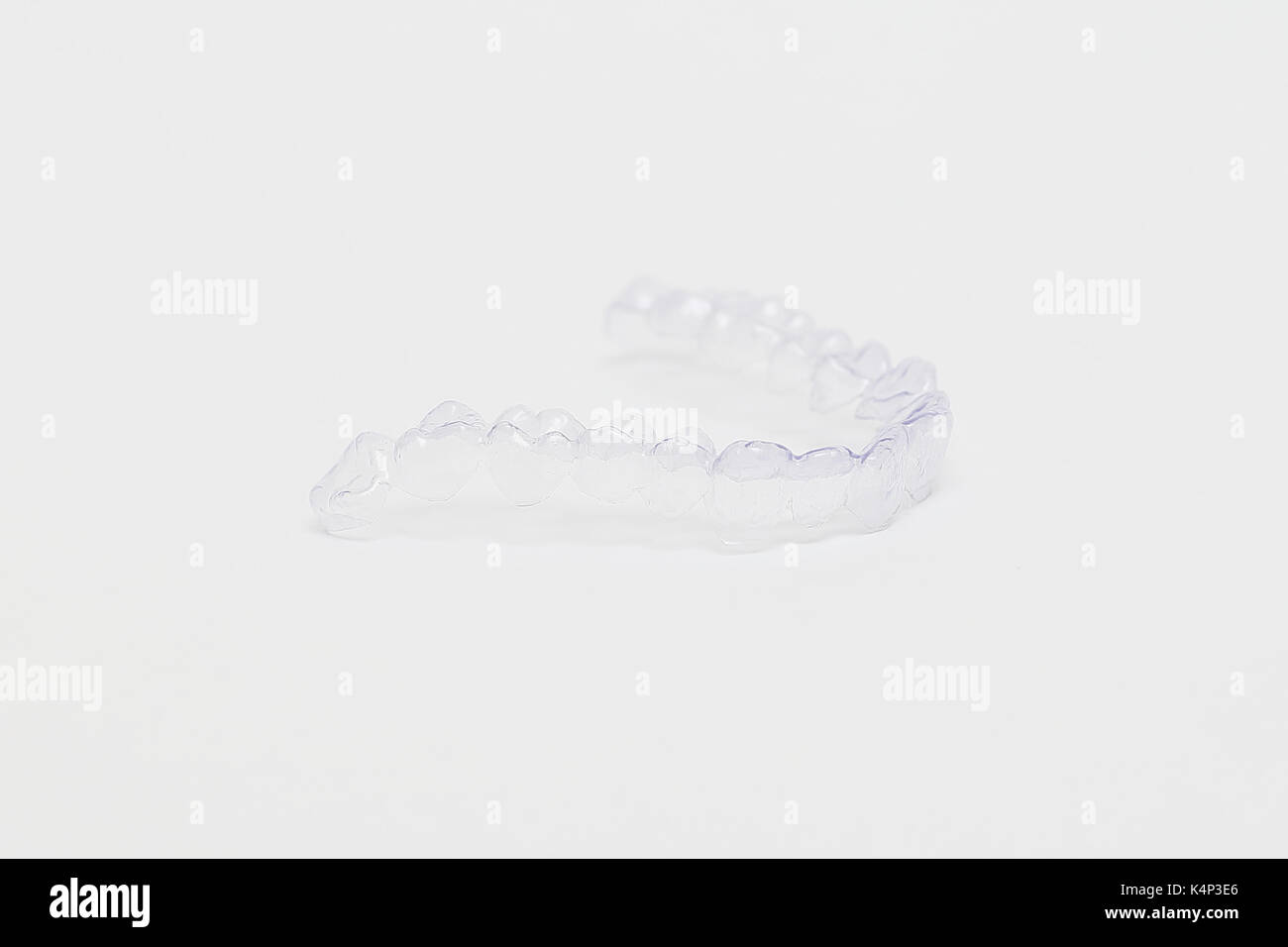 Closeup individual tooth tray Orthodontic dental theme. Invisible