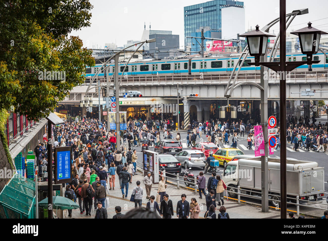 A busy train station near Ueno Onshi Park, Taito, Tokyo, Japan, Asia. Stock Photo
