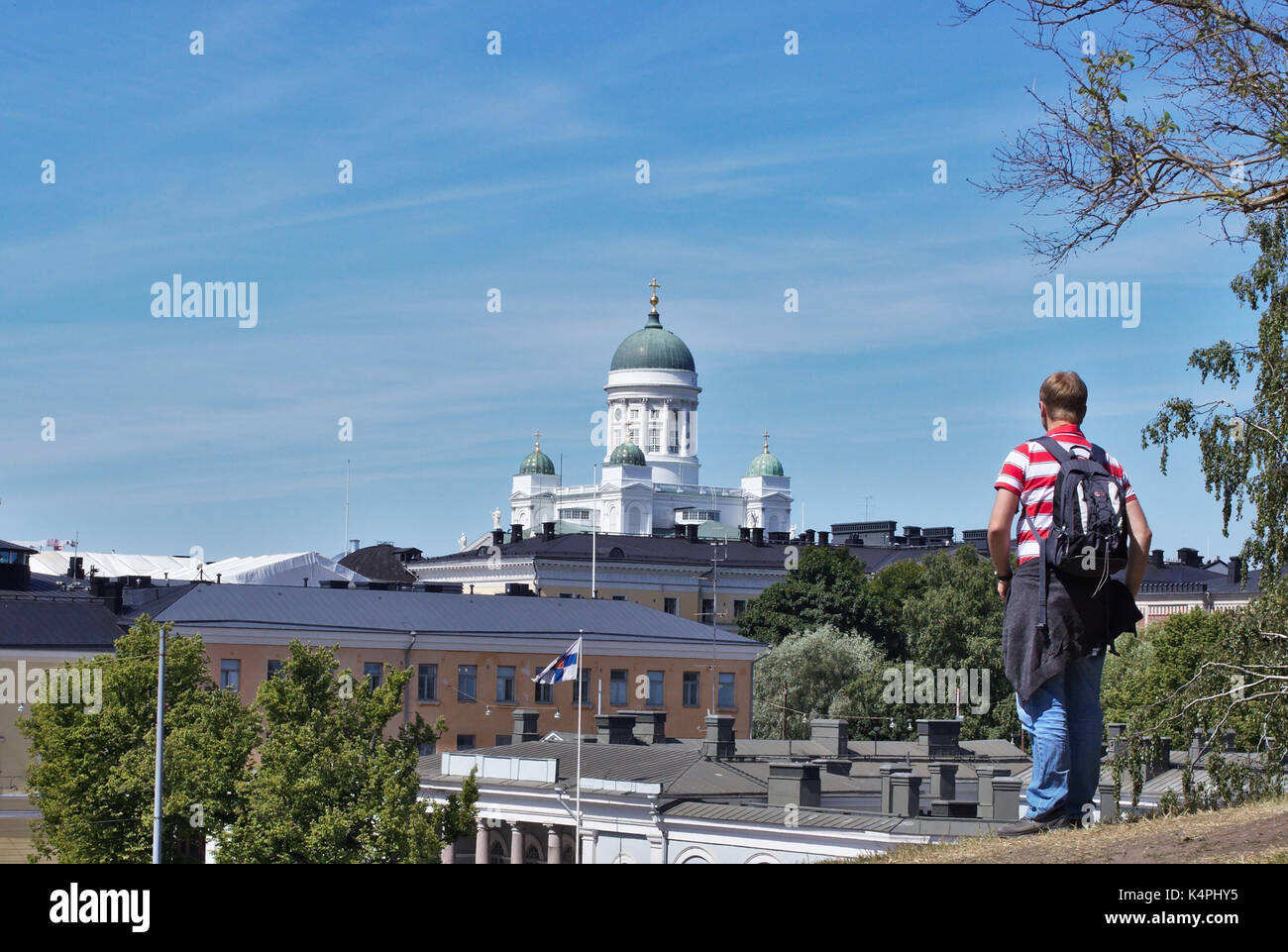 Tourist looking at Helsinki Cathedral from afar Stock Photo