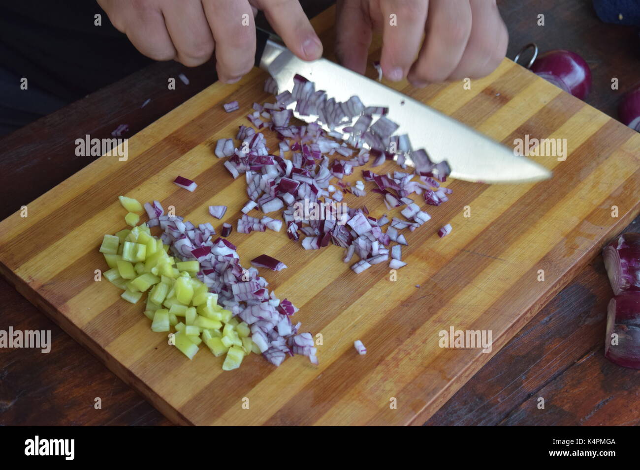 Onion cutting chefs hands knife hi-res stock photography and images - Alamy