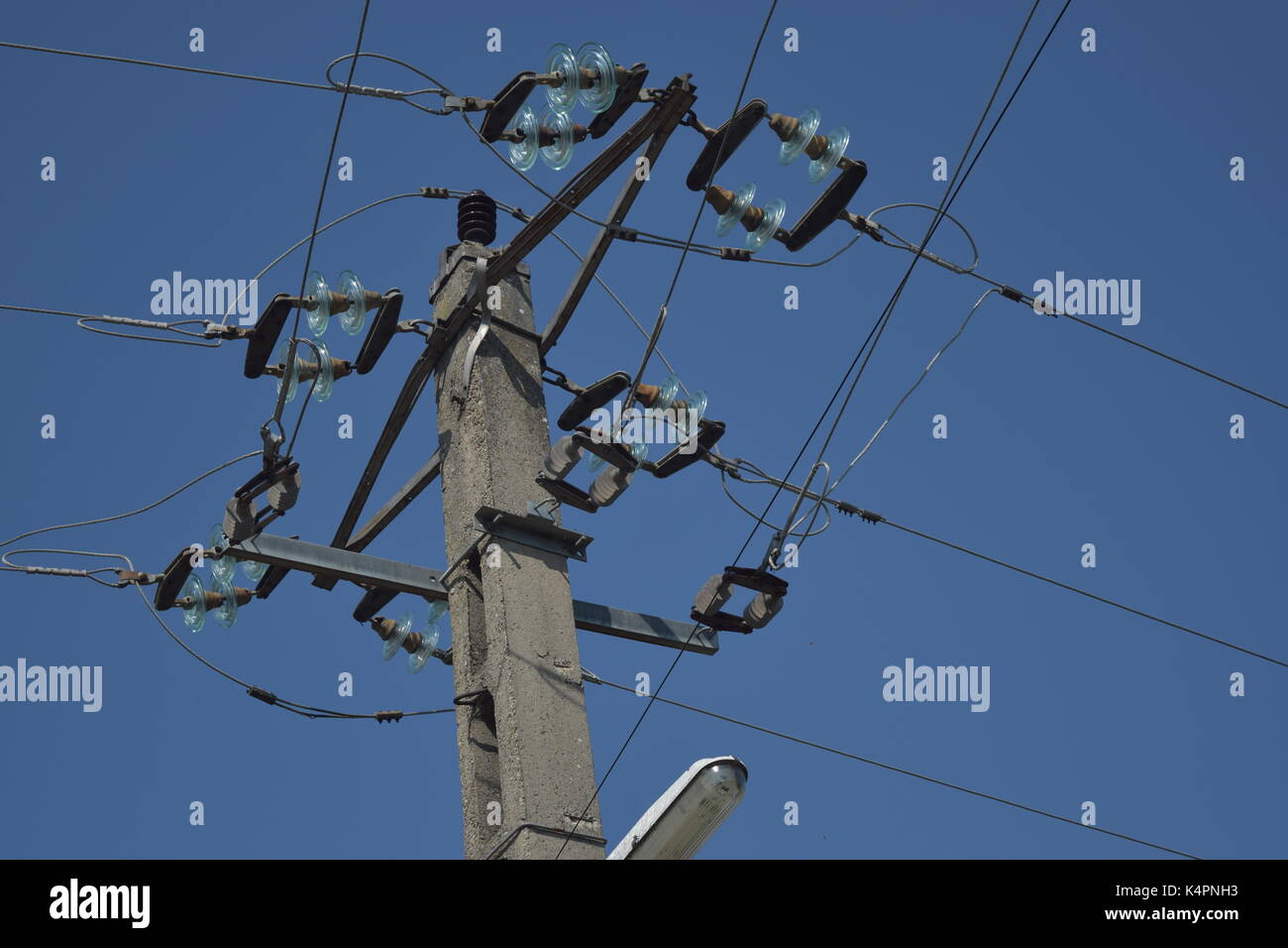 Tall electric line on a pole Stock Photo