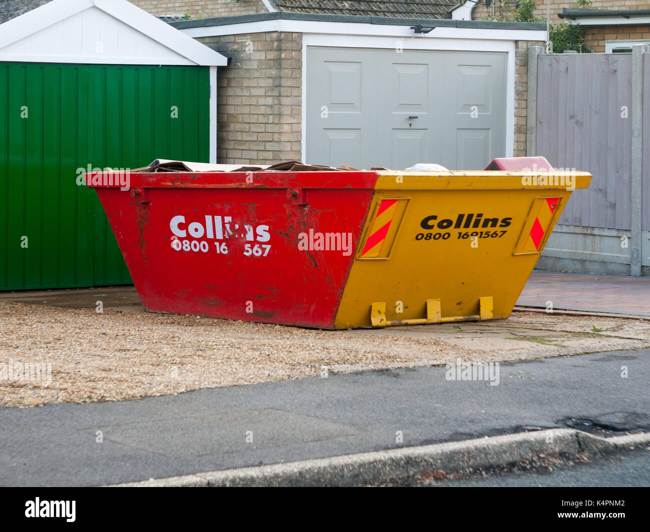 skip waste outside of house residential construction zone area bin