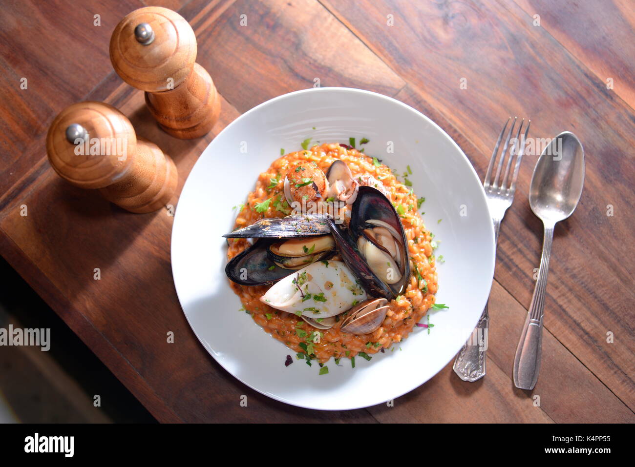 peacock clam tomato stew rice Stock Photo Alamy