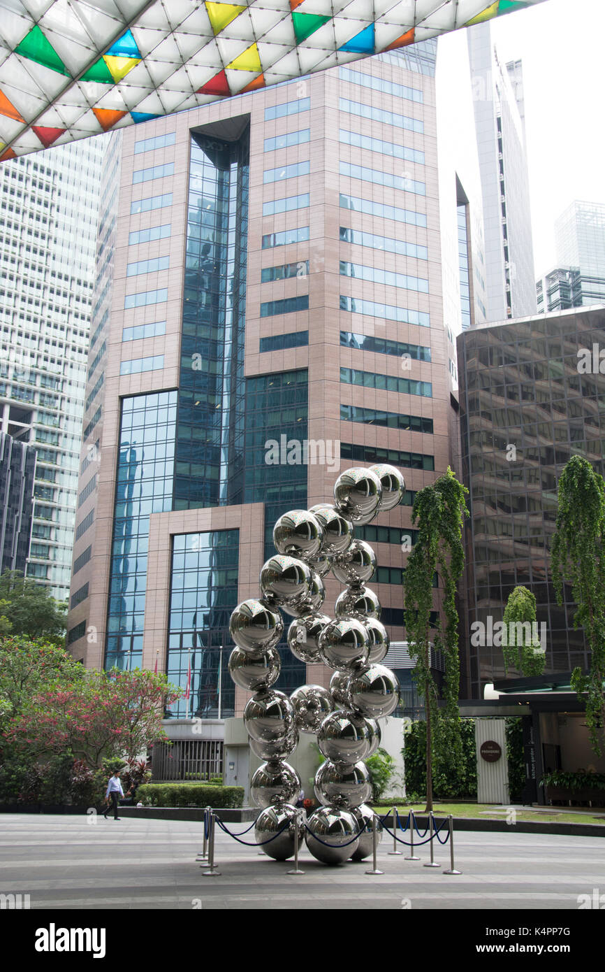 'Shining Atoms' culpture at the Ocean Financial Centre, Raffles Place, in the financial district of Singapore Stock Photo
