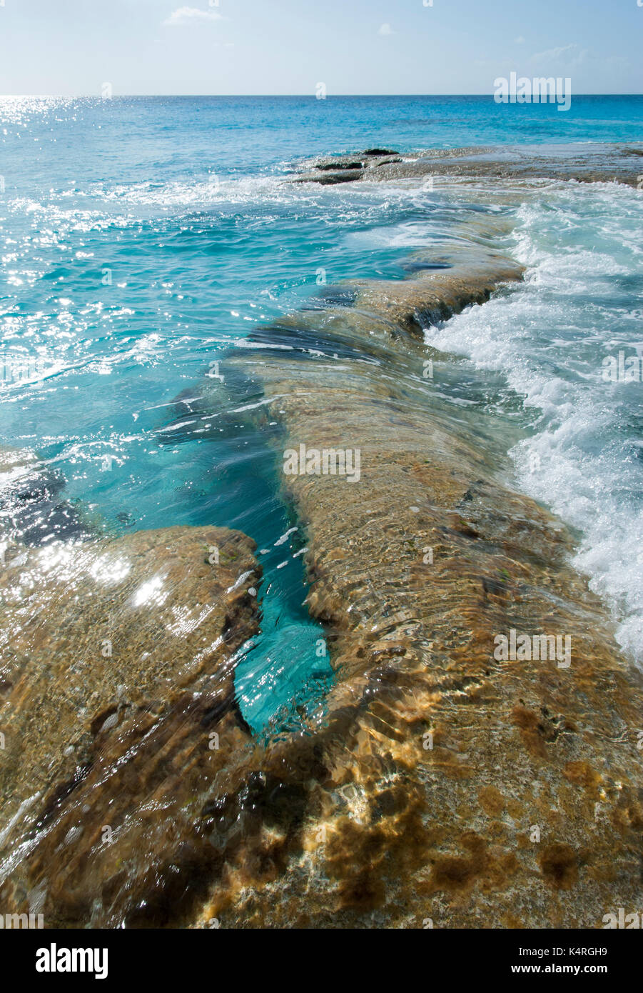 Sea water rushing through rocks hi-res stock photography and images - Alamy