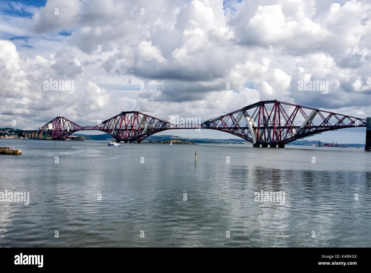 The Forth Rail Cantilever Bridge running across the Firth of Forth is an iconic structure connecting North and South Queensferry Edinburgh Scotland Stock Photo