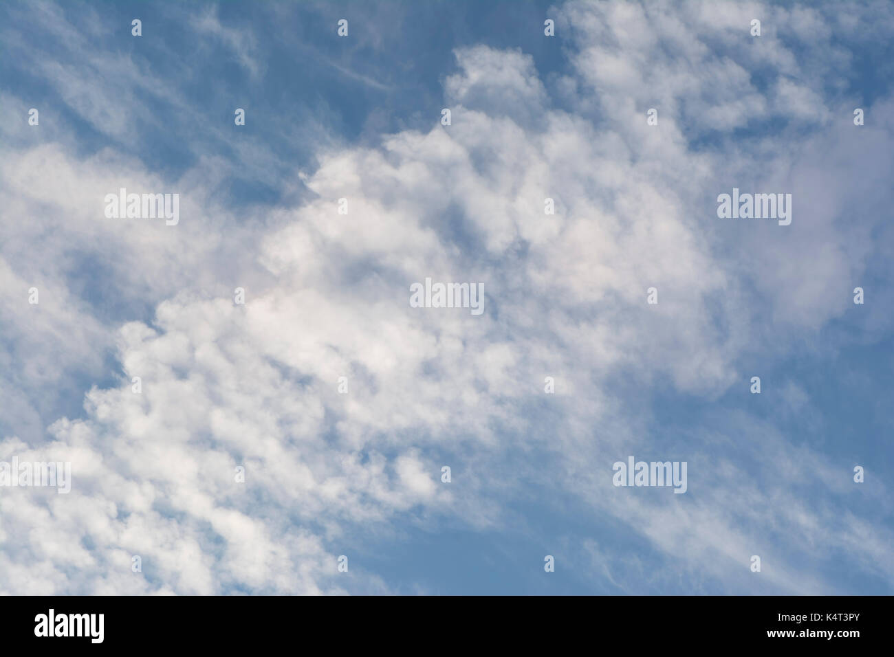 Abstract and unusual cloud formation against a blue sky, suitable for heavenly backgrounds and the clasifying of cloud and weather types. Close up pos Stock Photo