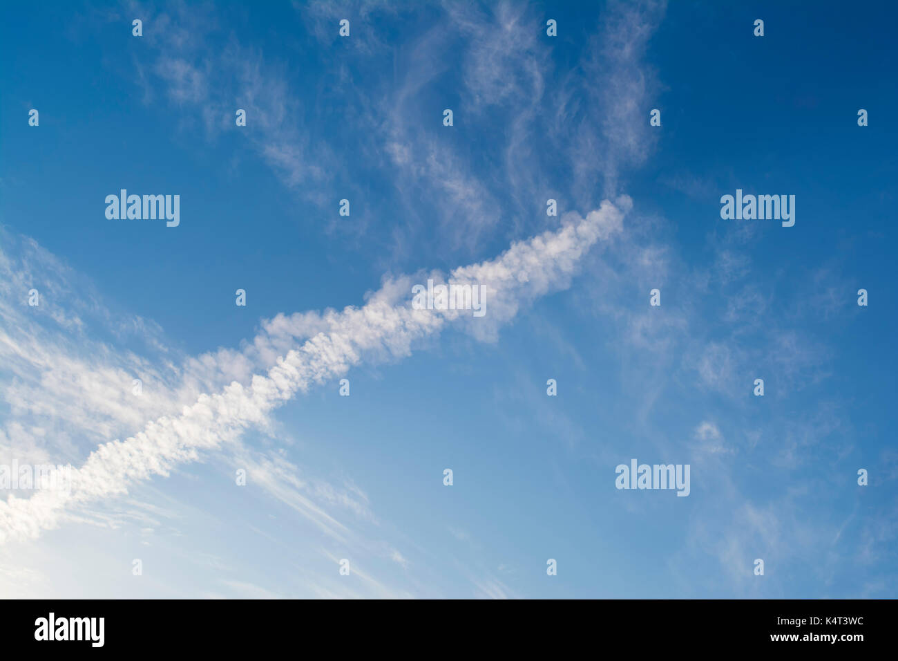 Abstract and unusual cloud formations against a blue sky, suitable for heavenly backgrounds and the clasifying of cloud and weather types. Potentially Stock Photo
