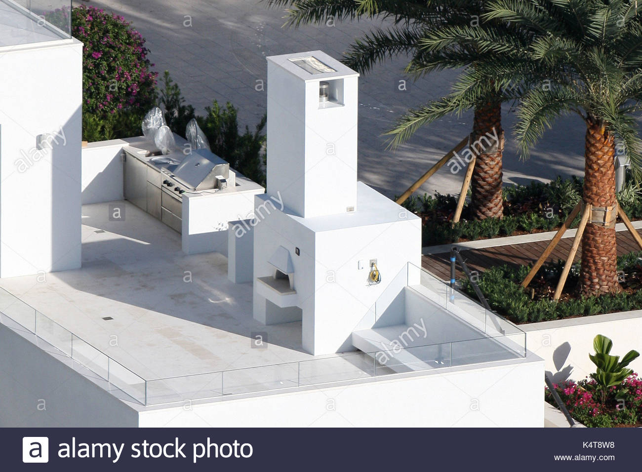 Tiger Wood's house in Jupiter Island, Florida. Workmen carry out the