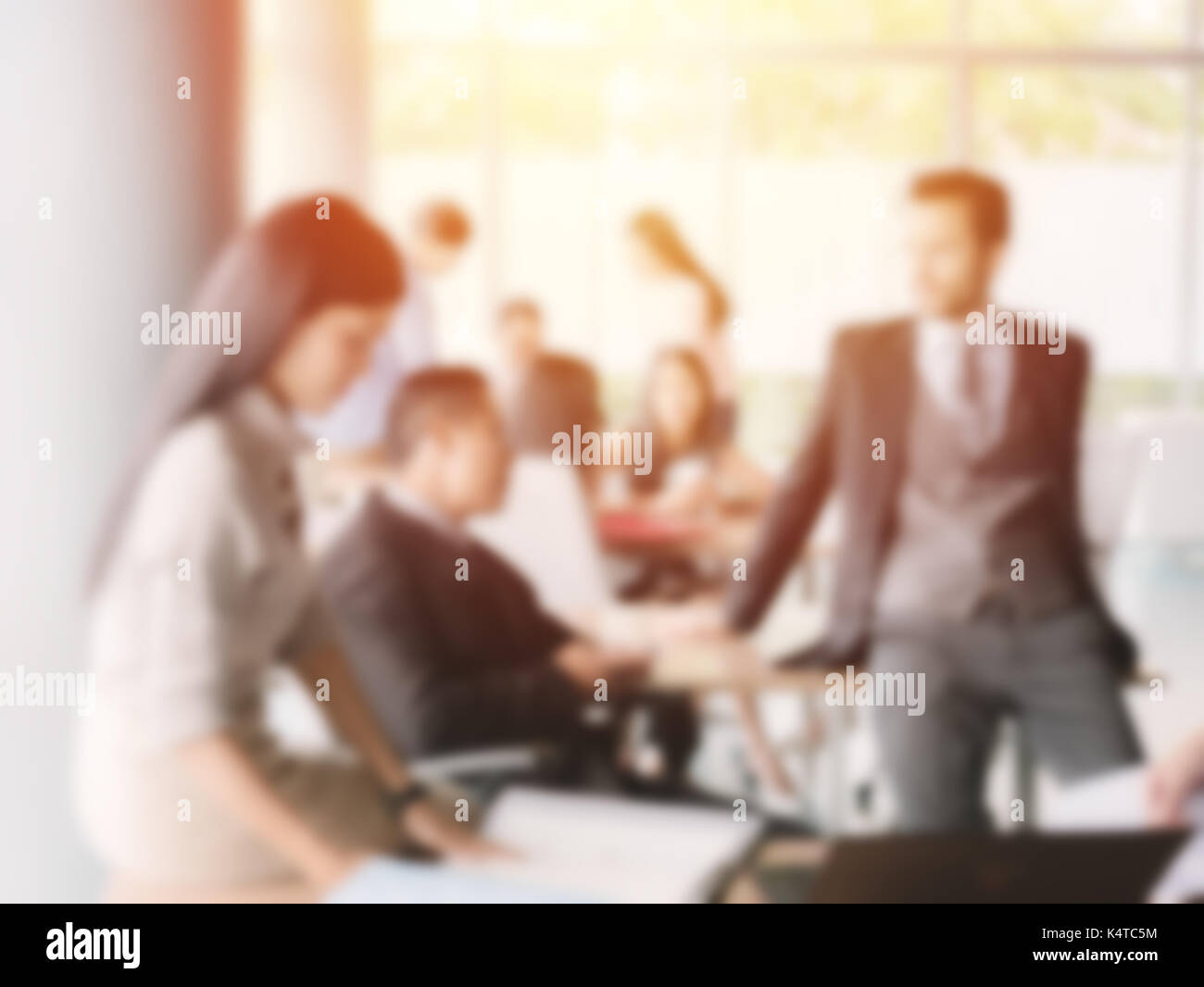 Blurred business people relaxing in press conference breaking time or relaxed period during an office montly meeting business concept Stock Photo