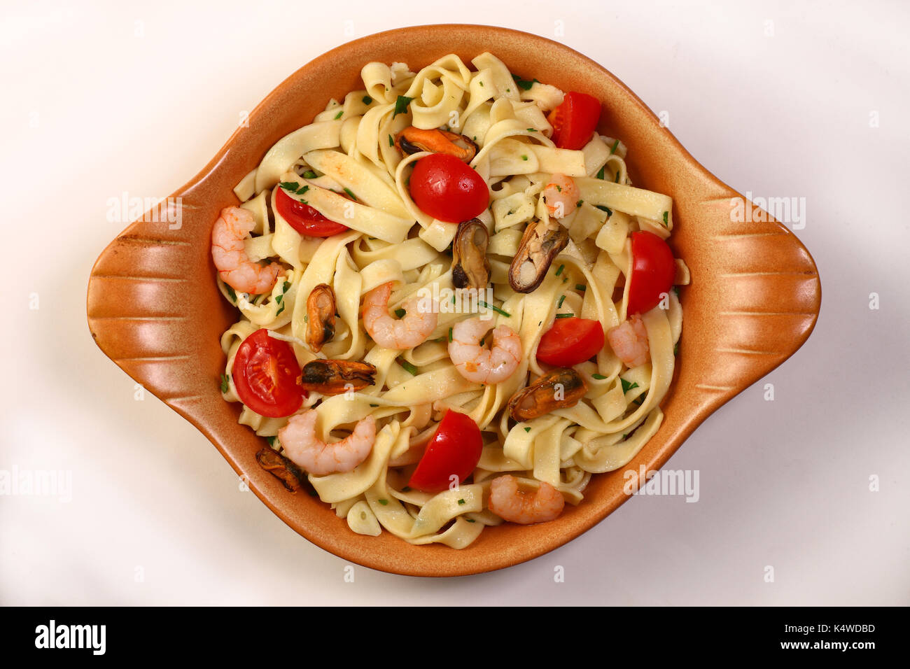 Pasta. Seafood Pasta with Shrimp, Scallops and Tomato. Italian Cuisine