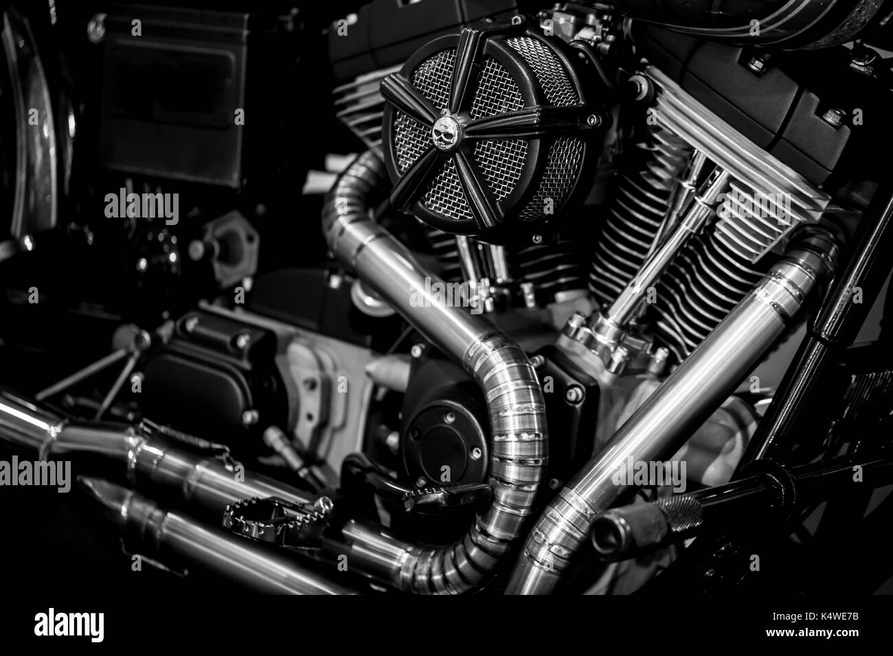Motorcycle engine engine exhaust pipes art photography in black and white Stock Photo